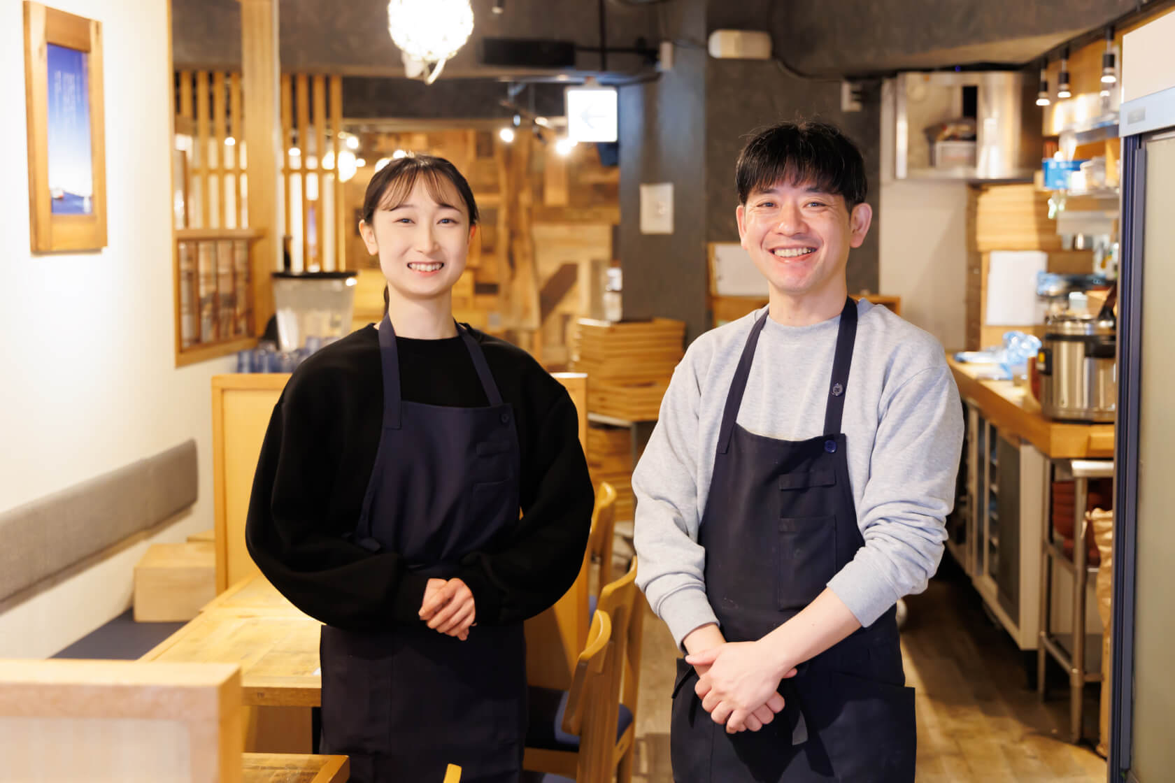 店長と社員の写真